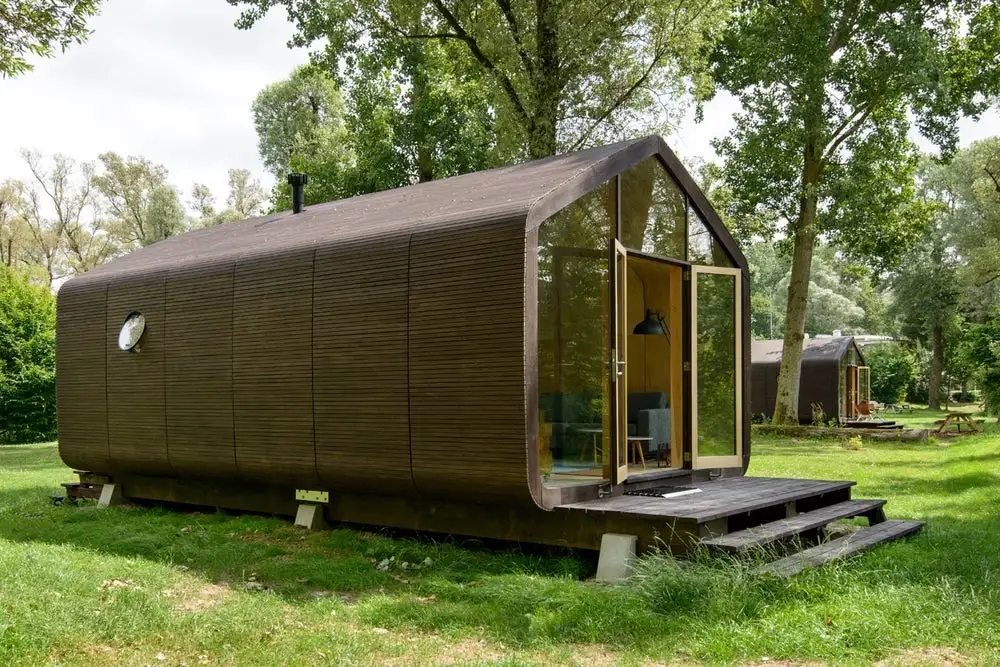 The Wikkelhouse is raised slightly off-the-ground and doesn't require foundation
