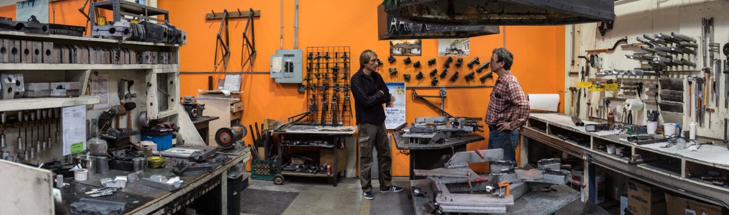 Dezso Molnar with Craig Calfee in Calfee's carbon fiber shaping workshop