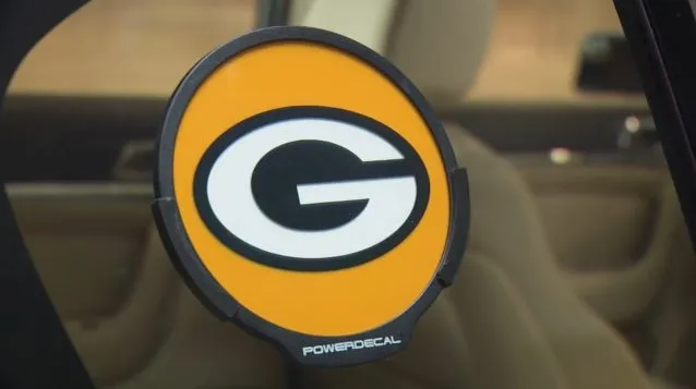 The Powerdecal displays backlit images through the window glass of a car