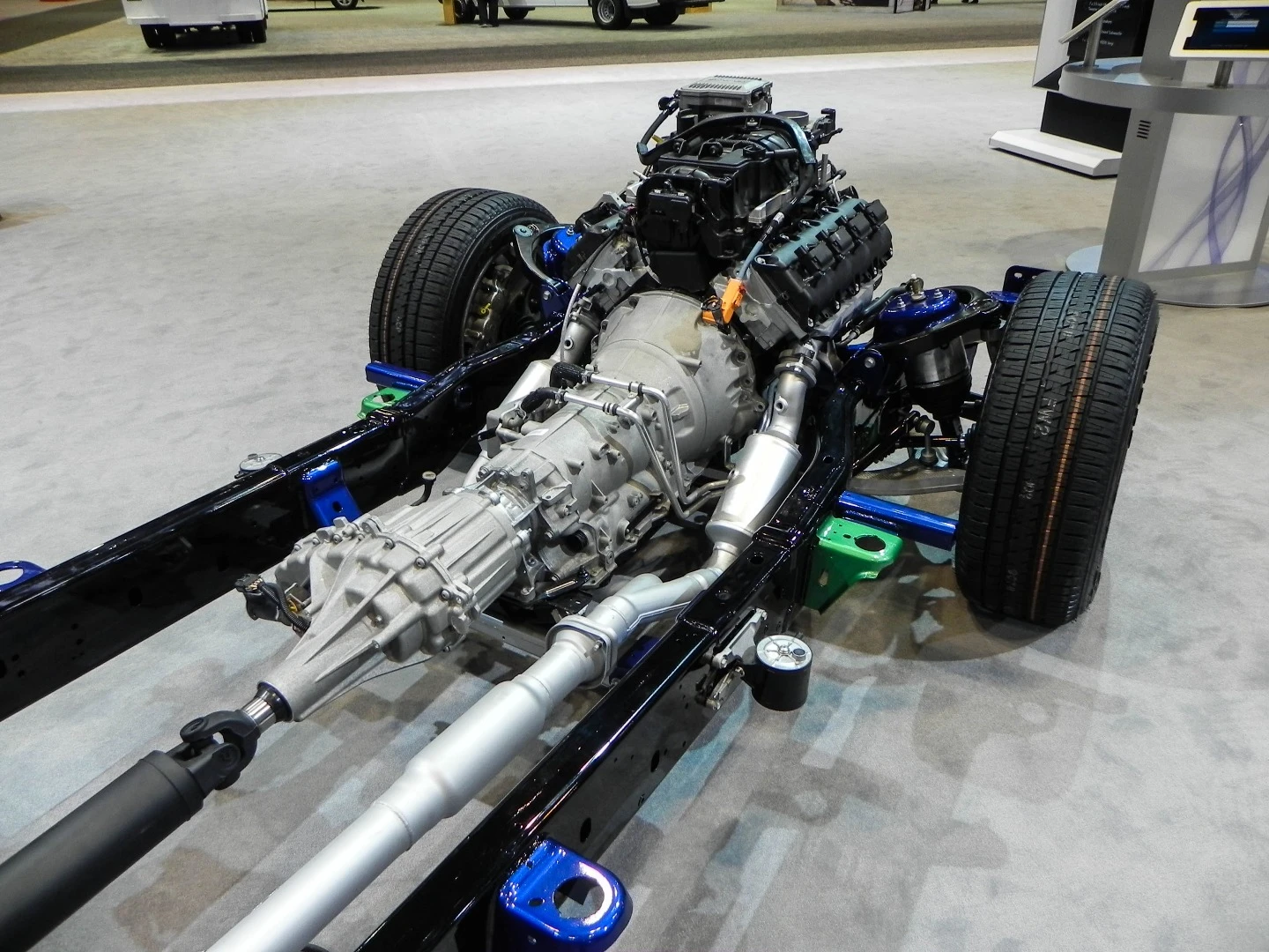 Here the Ram's transmission comes off of the 8-cylinder engine while exhaust pipe routing can be seen