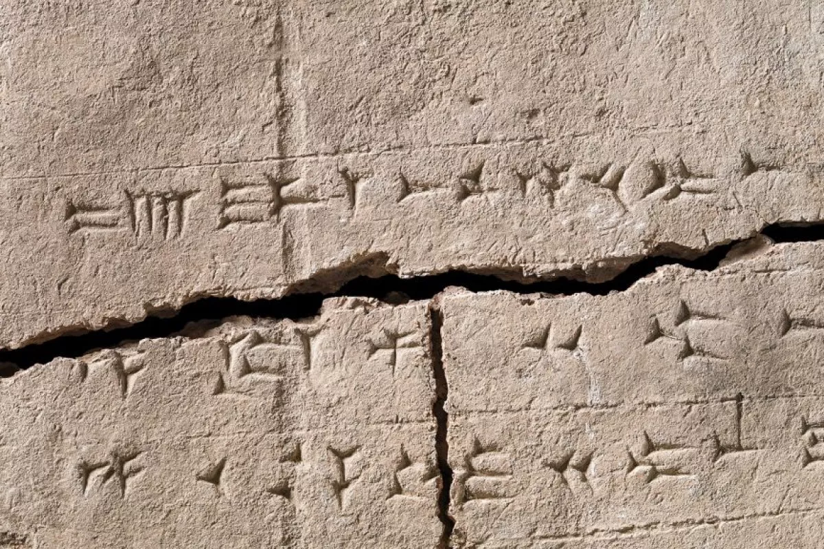 The 2,900-year-old clay brick, complete with inscription, from which scientists have now extracted DNA through the recent vertical crack