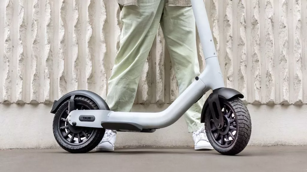 The foot platforms of the Taur II electric scooter give the rider a forward stance