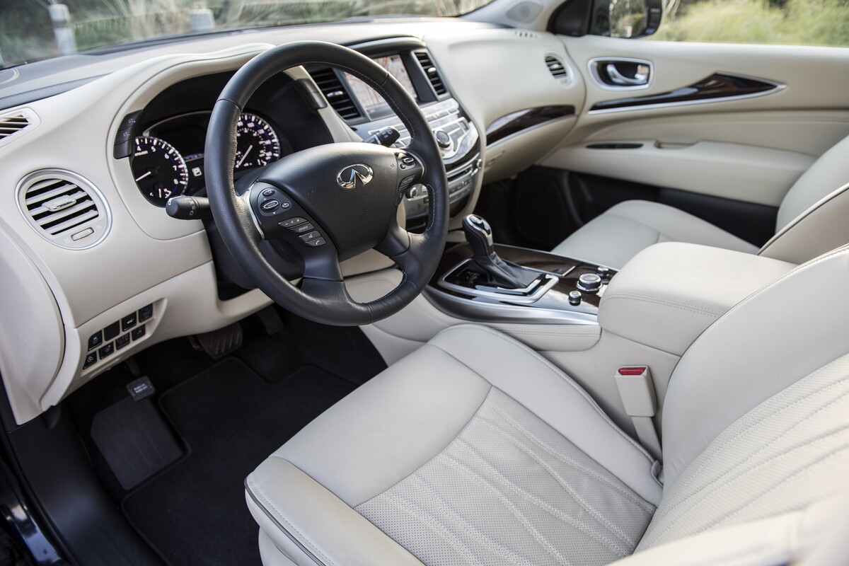 Wood, leather, and metal all adorn the QX60's interior in a graceful layout