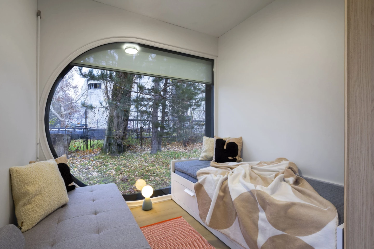 The Ecocapsule Box's bedroom doubles as its living room and includes a sofa, though other configurations are also available