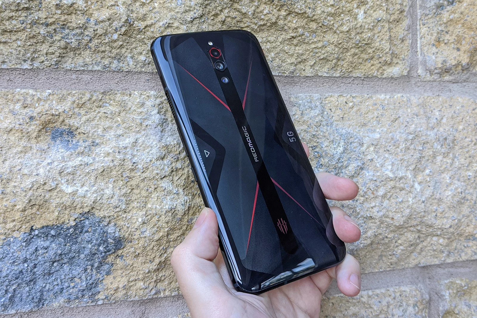 A triple-lens rear camera sits on the back