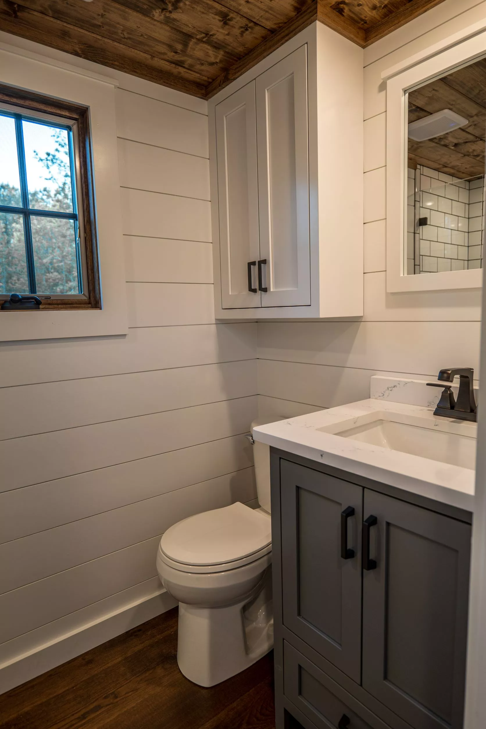 The Teton's bathroom includes a sink, toilet, and shower, as well as a little extra storage space