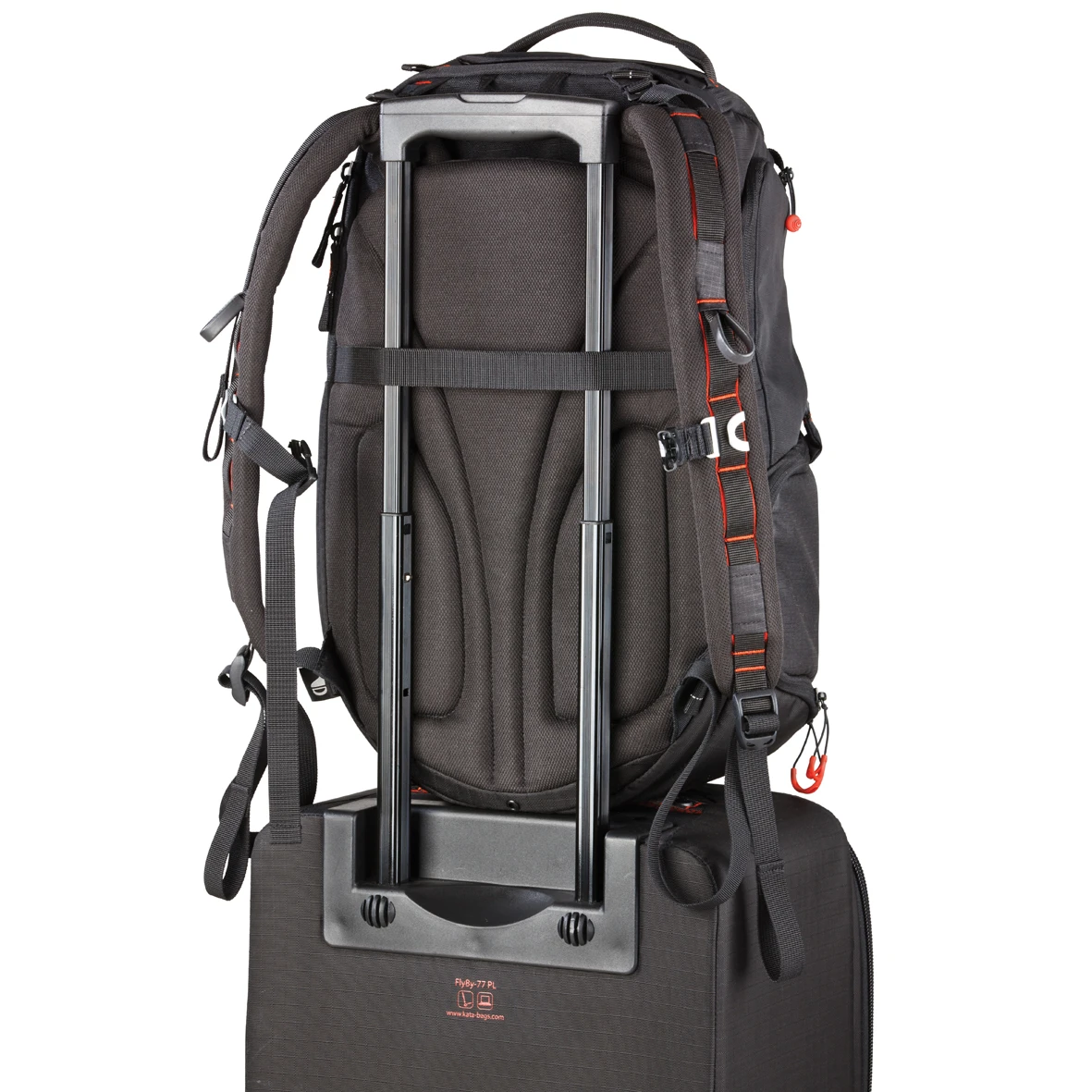 Additional straps can attach the Revolver backpack to a trolley suitcase if needed.