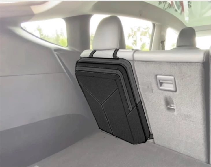 The Tail Table stows away behind the rear seats