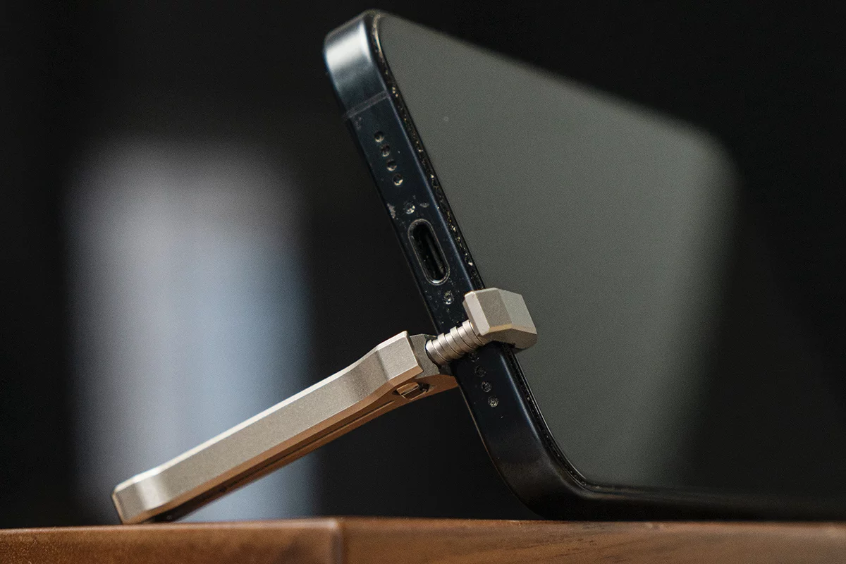 The TiSpanner 2.0 pulling smartphone-stand duty