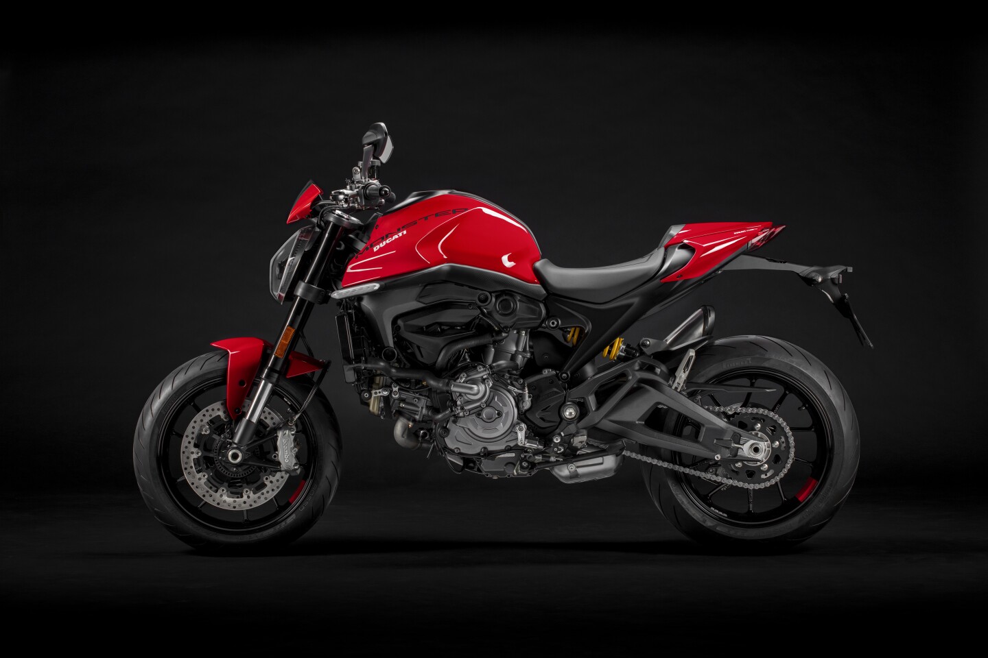 Add a small screen and a rear seat cover to the 2021 Ducati Monster for the Plus version