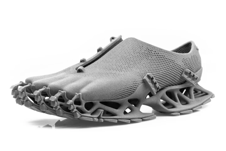 The 3D-printed Cryptide sneakers feature a super-flexible sock up top, and a highly technical, deforming plated sole designed to leave mystifying footprints