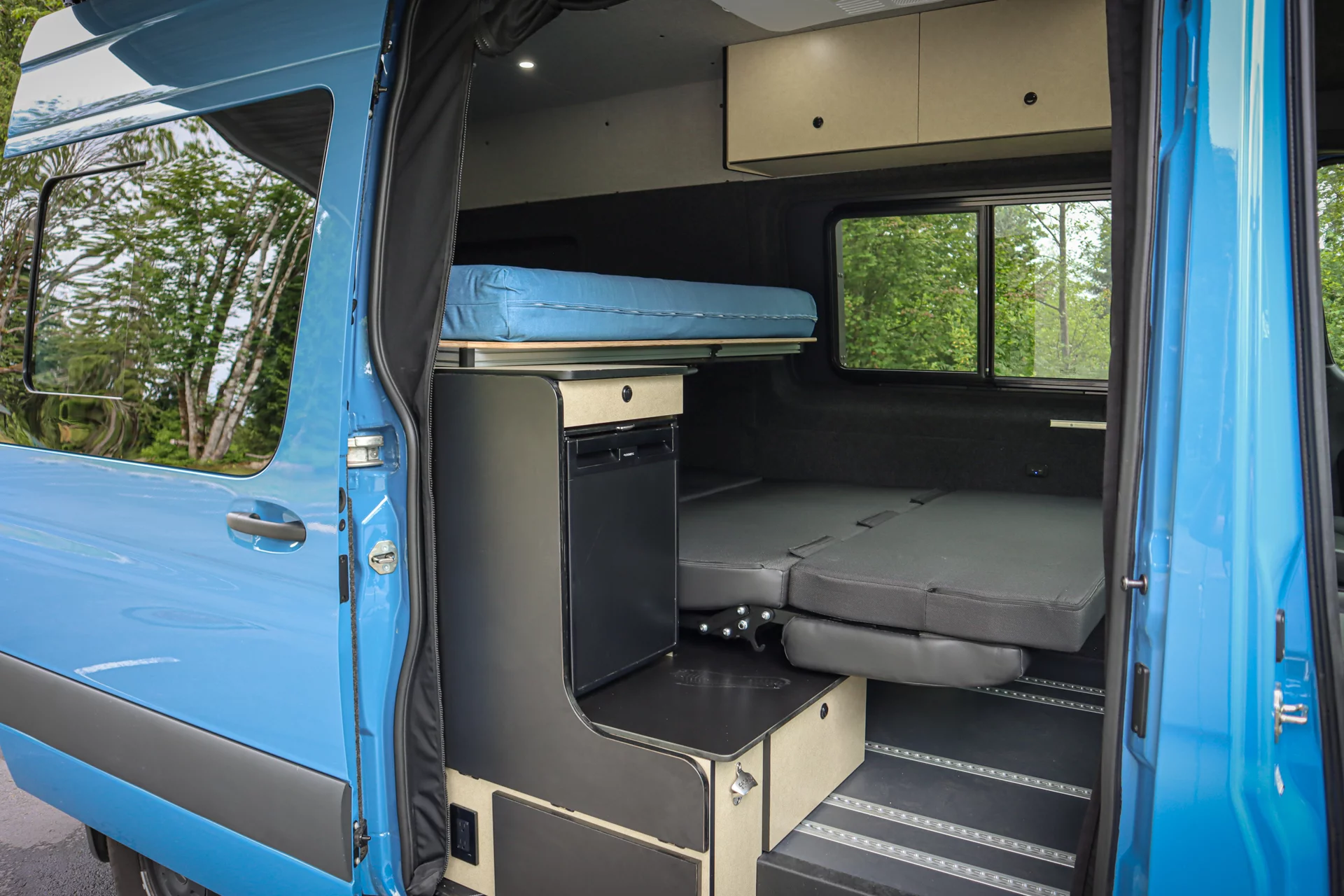 The upper bed features a 60 x 80-in residential queen-size mattress for extra space and comfort