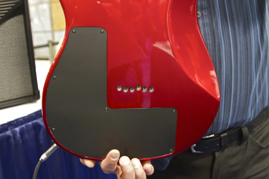 The only noticeable difference to the look of a standard guitar is a slightly larger back plate