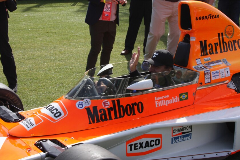 Twice winner of the World Formula One drivers Championship and two time Indianapolis 500 winner Emerson Fittipaldi was the guest of honor at Amelia Island, thrilling the crowds with an array of machinery he raced during his illustrious career. Here Emerson is pictured in the 1974 McLaren M23 in which he gave the now stellar marque its first of many drivers and constructors titles.