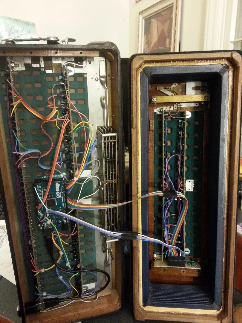 The Arduino Mega and key sensors to the left, and the button sensor setup to the right