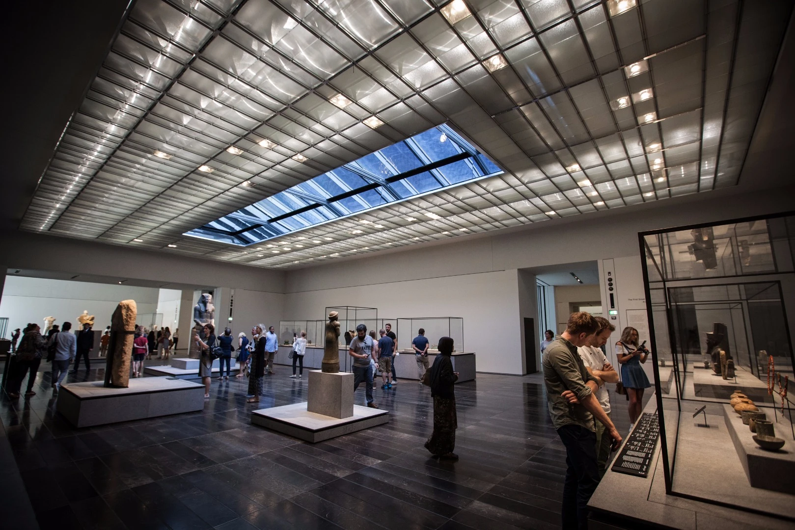 Visitors enjoy the exhibits at the Louvre Abu Dhabi