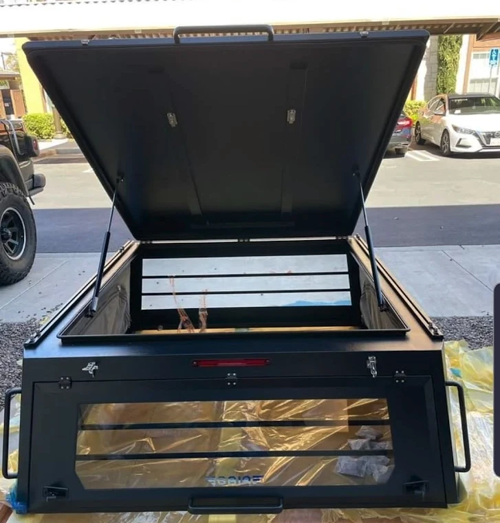 Gaia puts bars over the windows for extra security and to prevent cargo from sliding around and breaking them