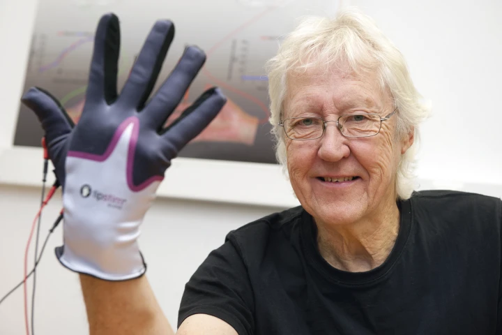 Electrical contacts located in the fingertips deliver short electrical pulses, stimulating the nerves which communicate with the brain