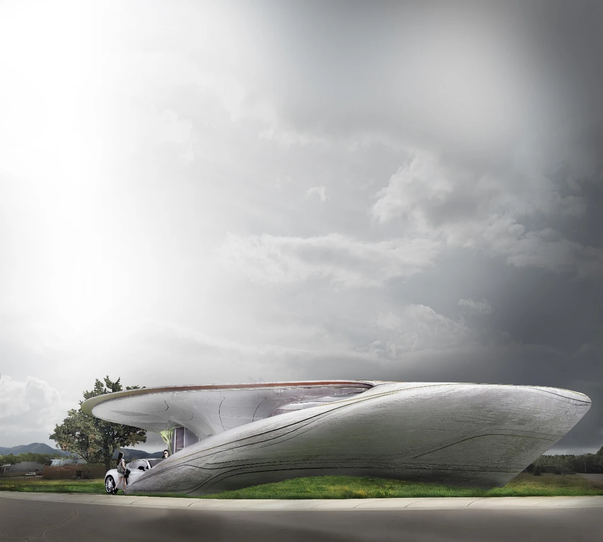 The curved form is designed to blend with the site like an organic presence