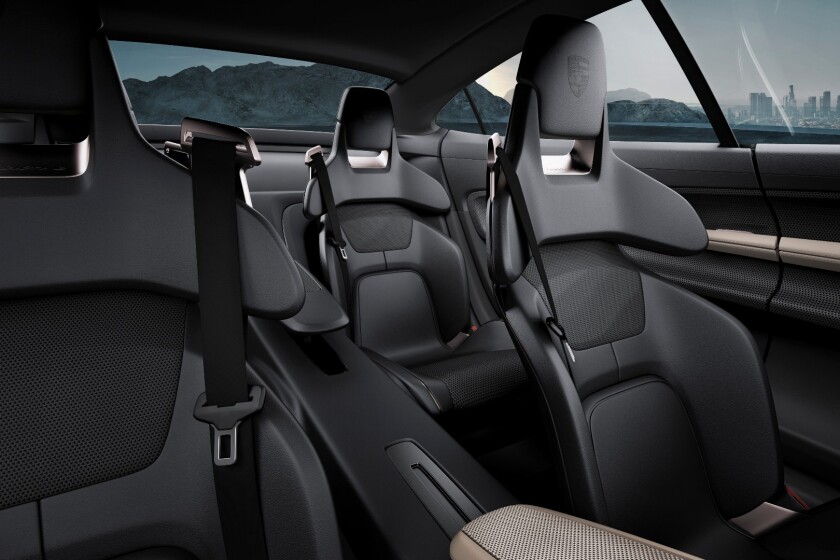Inside, the Mission E has seating for four passengers