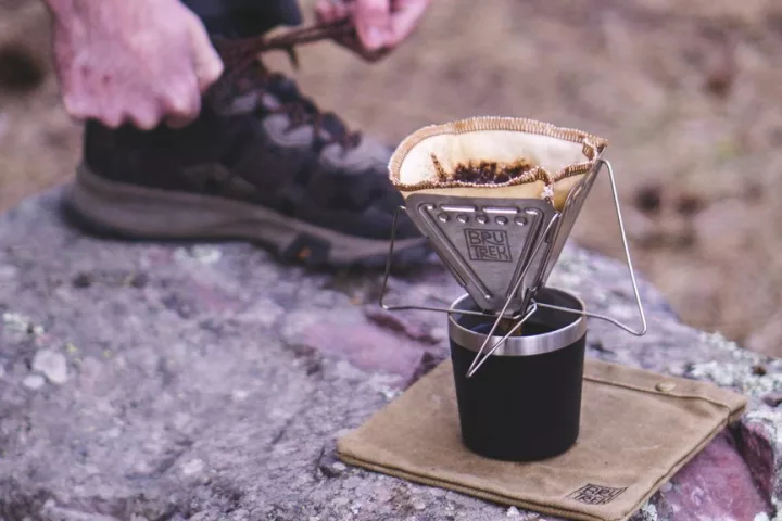 The Collapsible Pour Over coffee maker comes with reusable filters to minimize waste