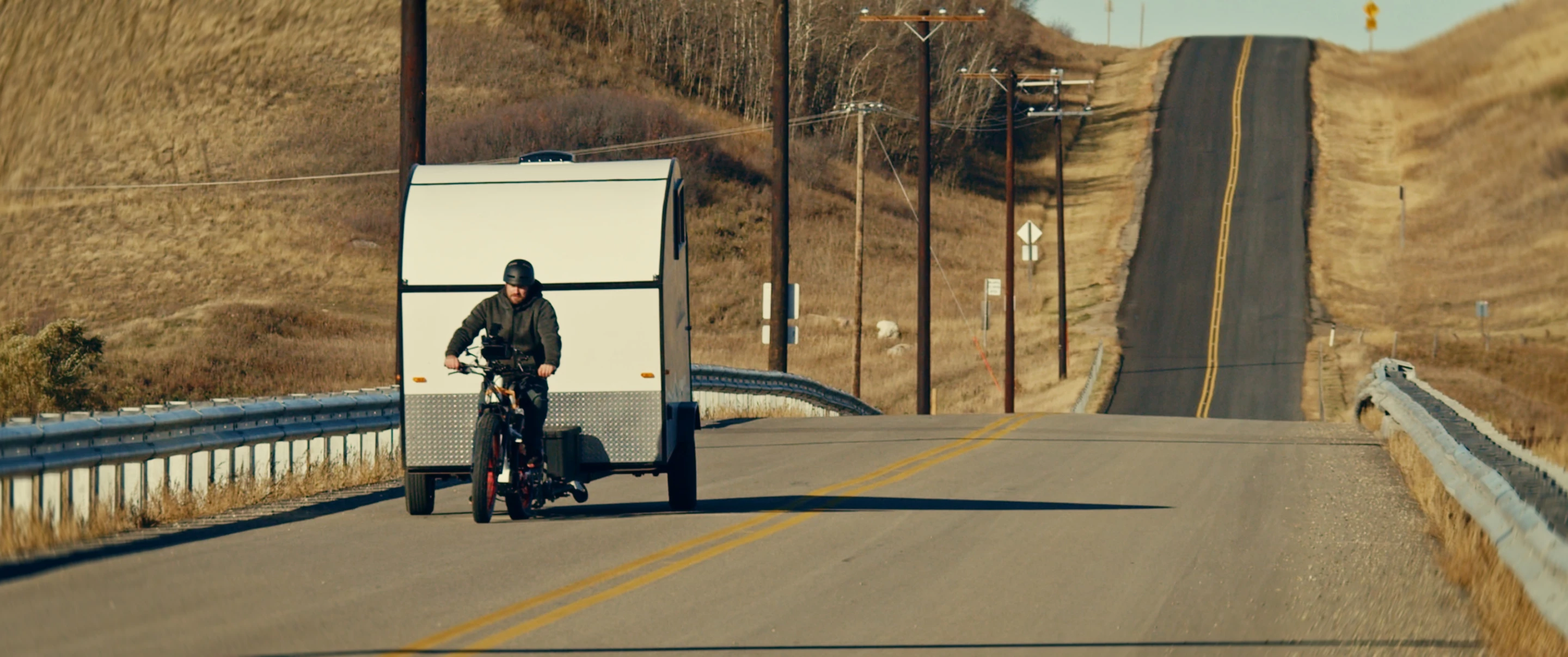According to Biktrix's video, this trailer weighs 1,750 lb, and while it wasn't a smooth ride in the park, the rider was able to roll with it for a bit
