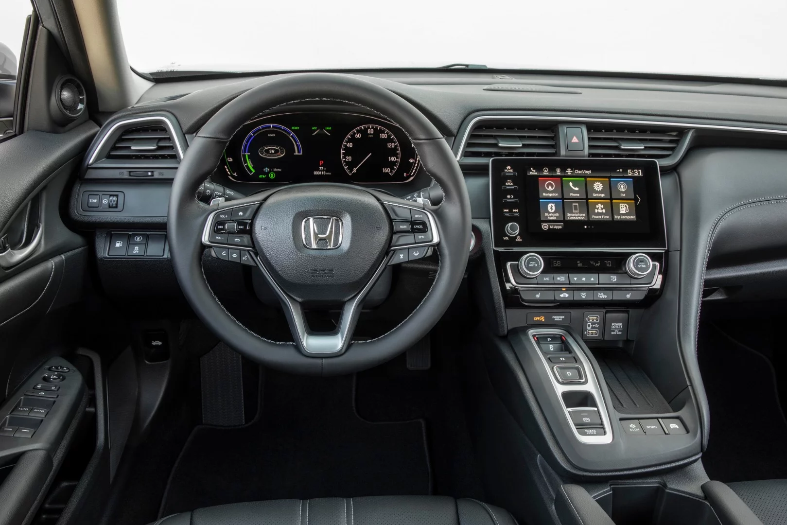 We’re not fond of the Honda-Acura push-button gear selection gimmick (at right), which seems pointless