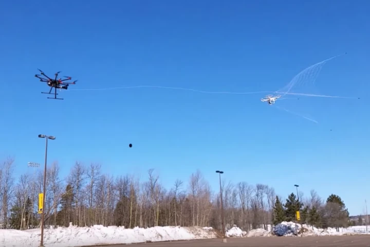 When it spots an illegal aircraft, the predator drone fires a net from as far as 40 ft (12 m) in its direction
