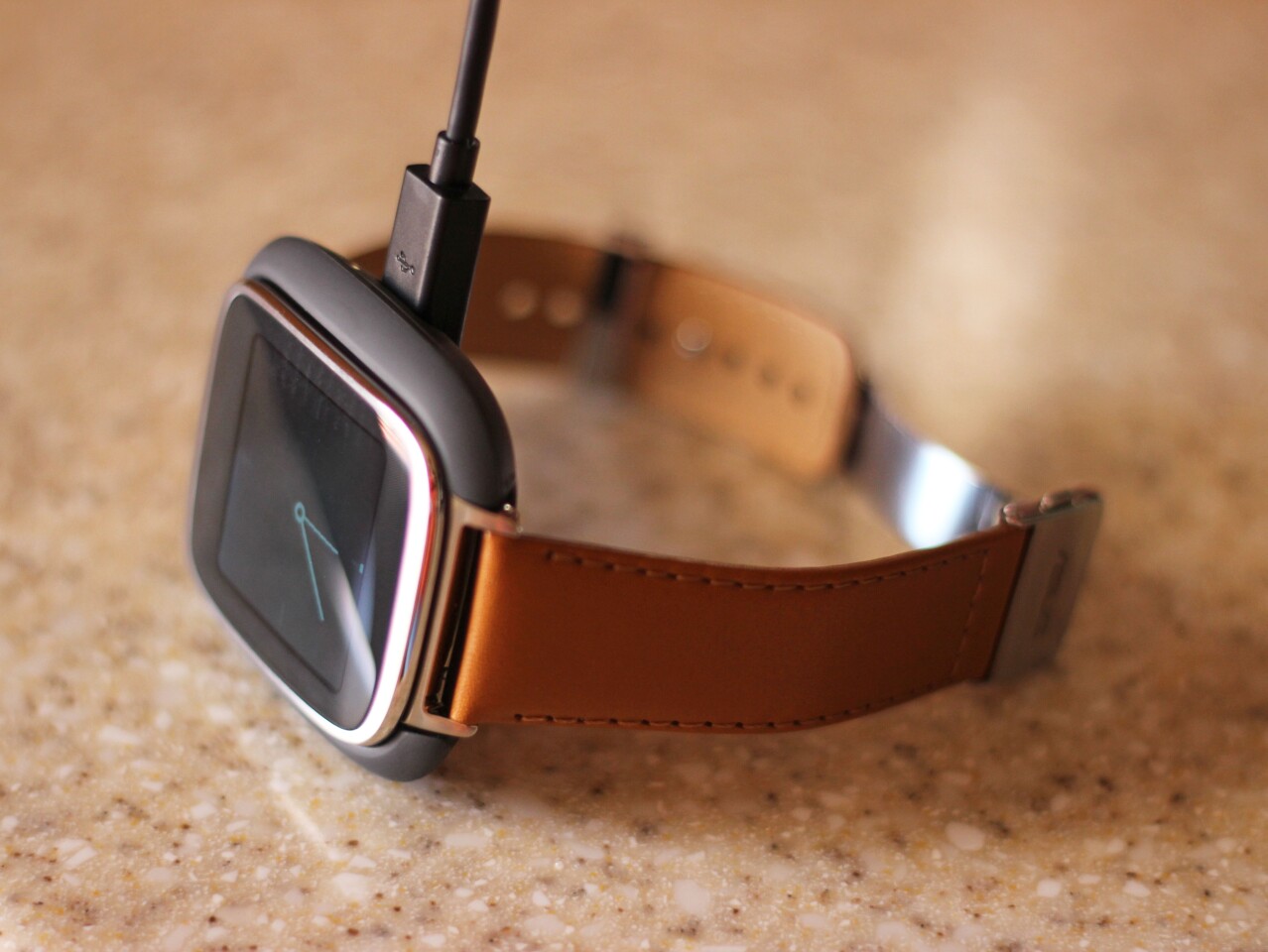 The ZenWatch in its charging cradle (Photo: Will Shanklin/Gizmag.com)