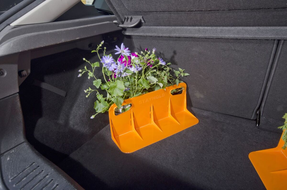 The Stayhold secures to the carpet with a Velcro strip