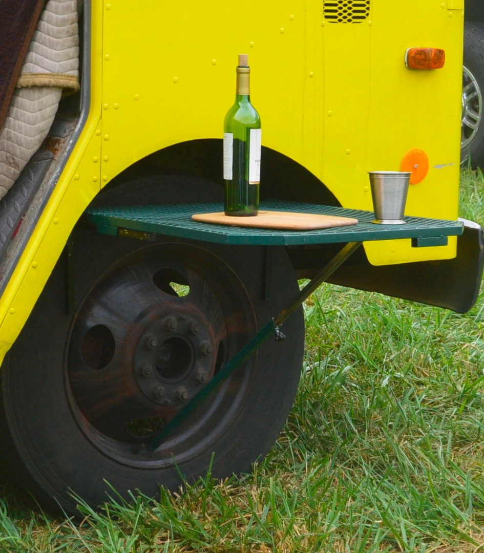 While many overlanding vehicles have slick slide-out kitchens and drop-down tables, there are simpler solutions