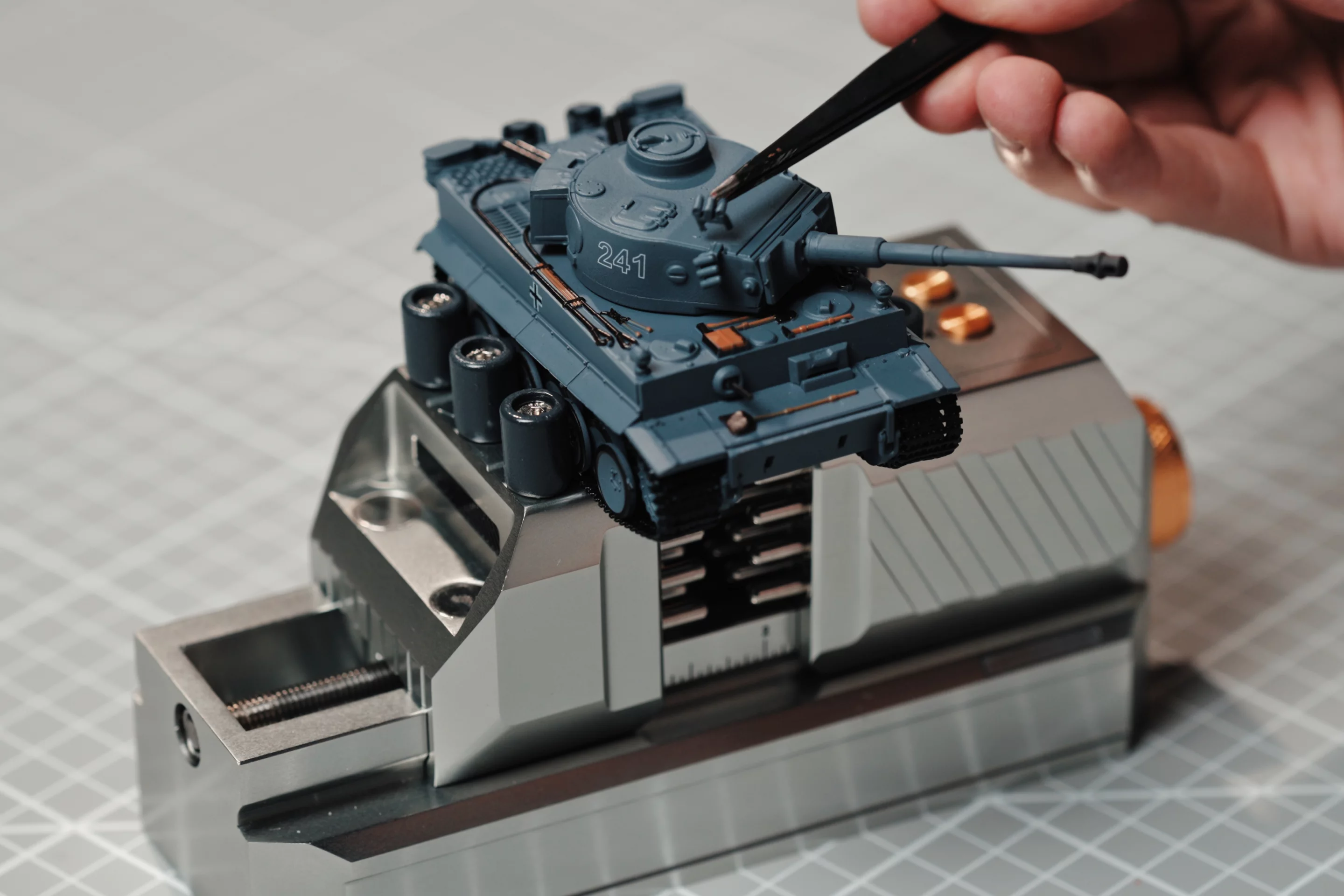 The K-One's optional top-mounted collets in tank-holding action