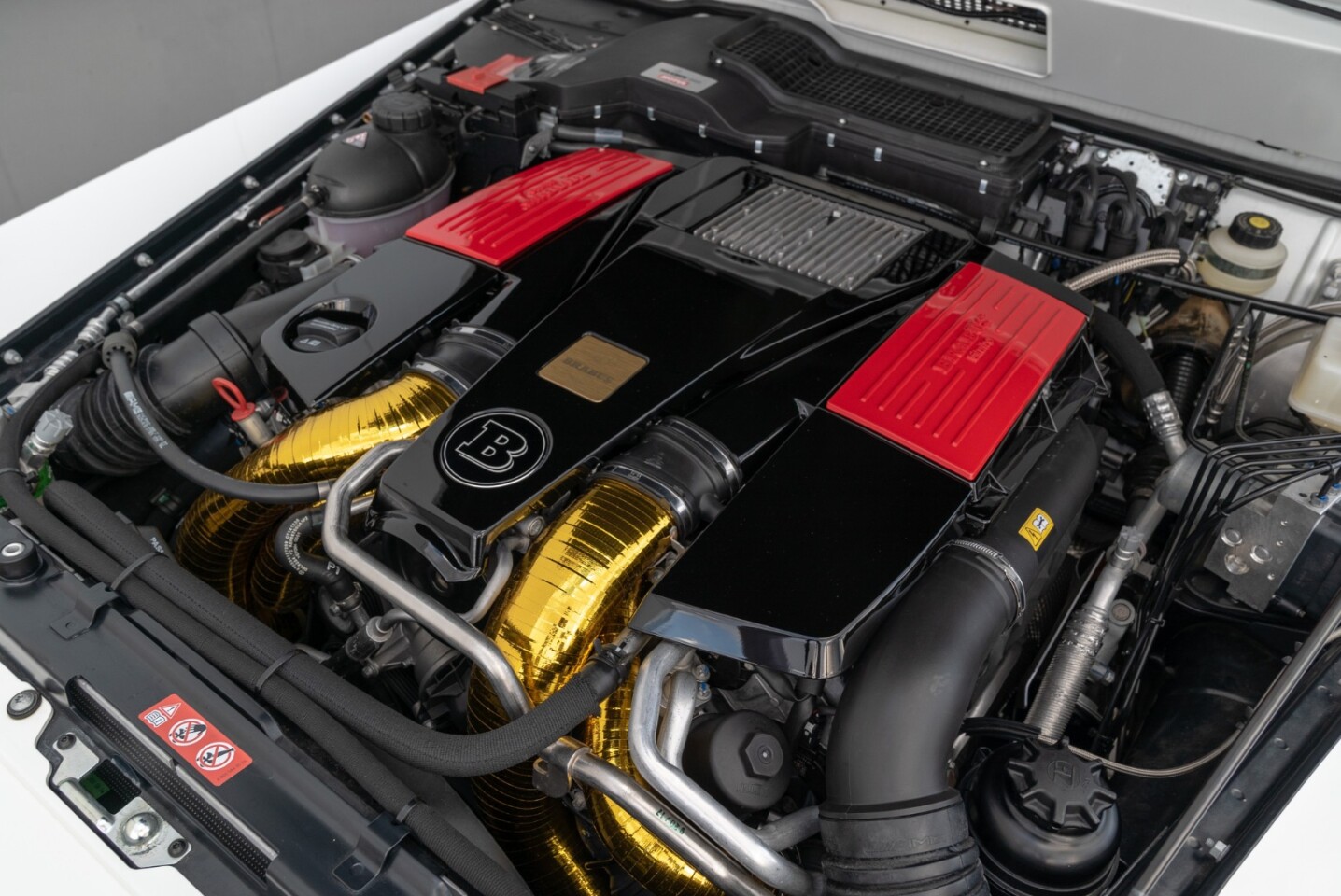 A flash of gold heat shielding under the hood
