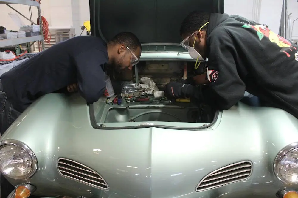 Team Ghia working on the car's electrics