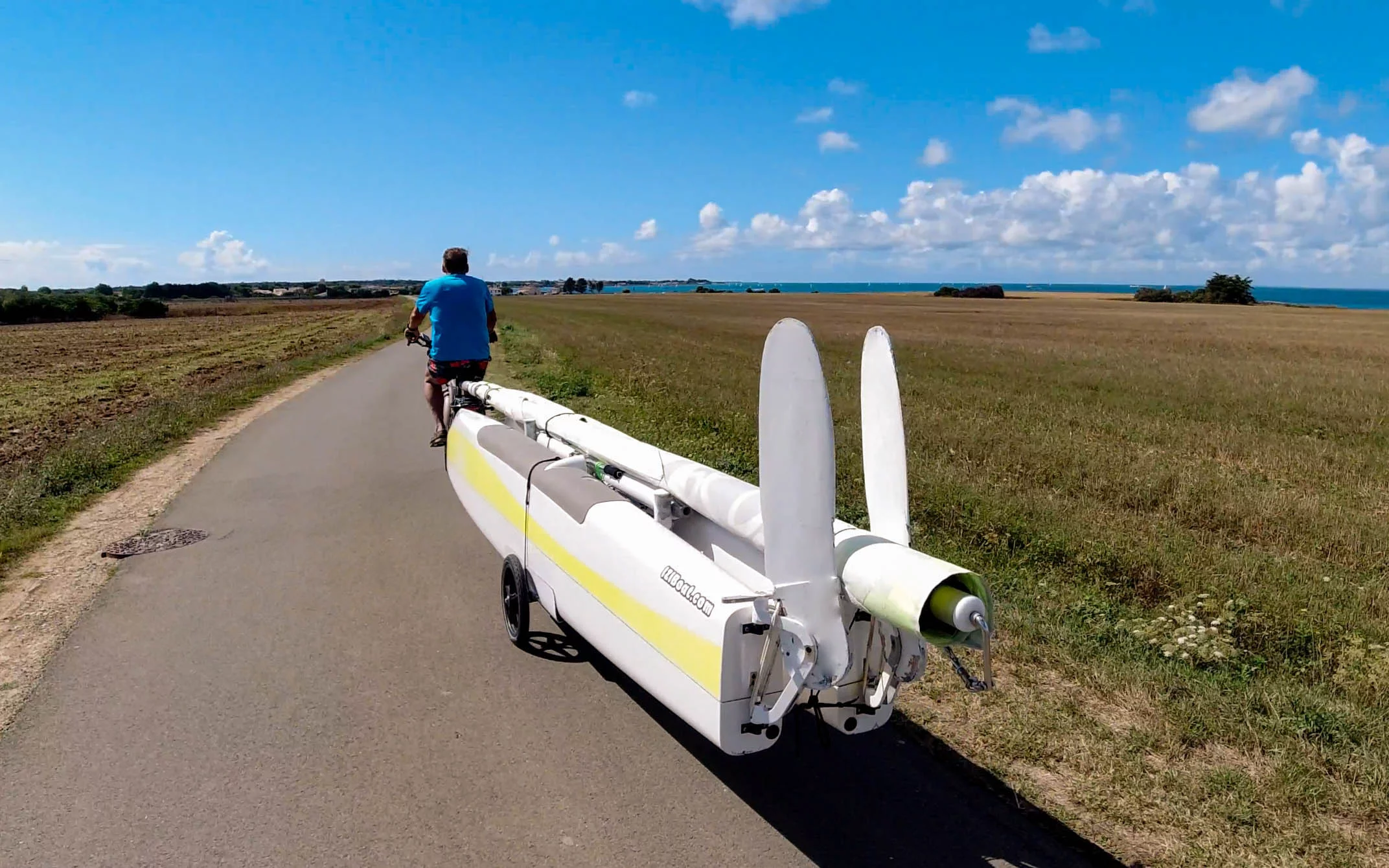 The IZIBoat can be collapsed down in 15 minutes and towed by ebike
