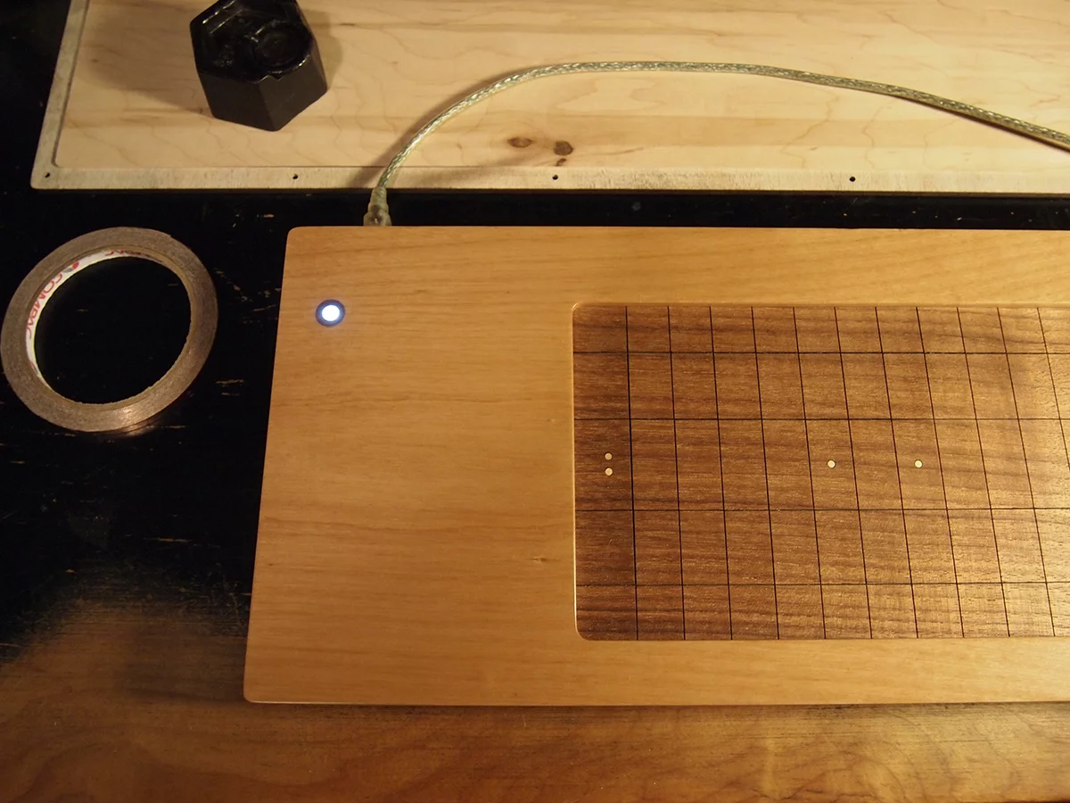 The playing surface consists of 150 walnut keys that are said to offer players the feel of an acoustic instrument