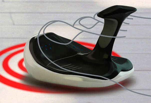 A user grips the fin with the first two toes and moves the mouse around to change the cursor position on screen, sensors at each toe detect click action