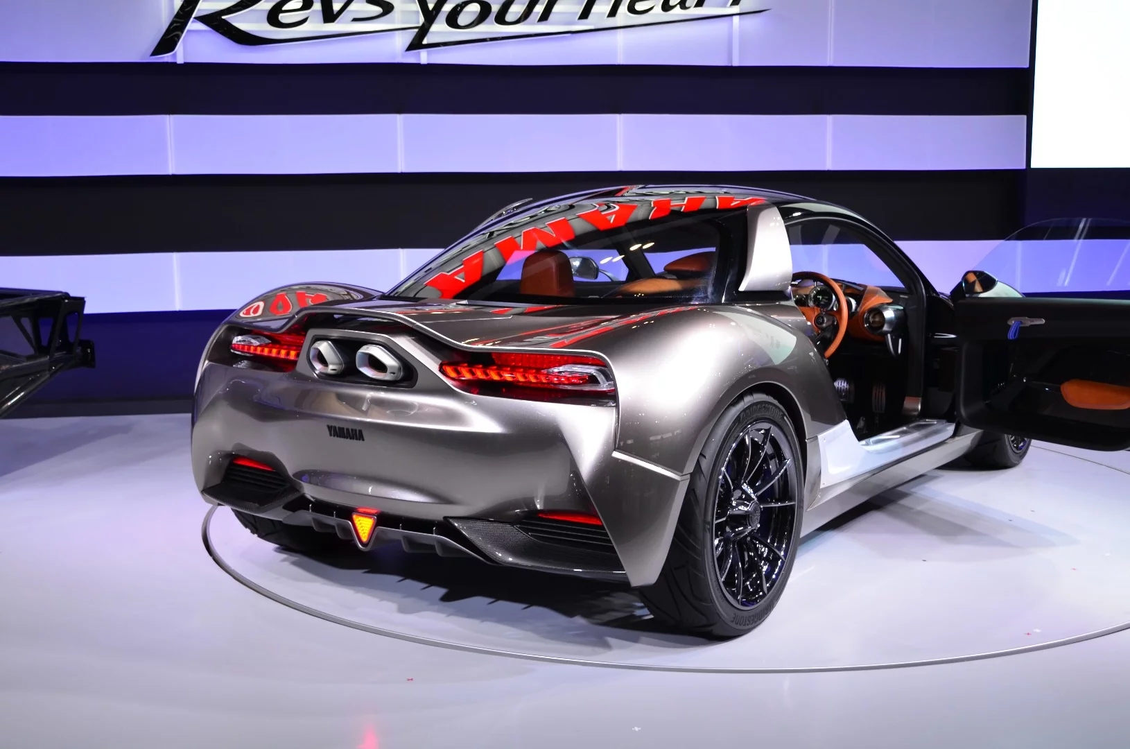 Two motorcycle-styled exhausts and a large diffuser take center stage in the Sports Ride Concept's rear