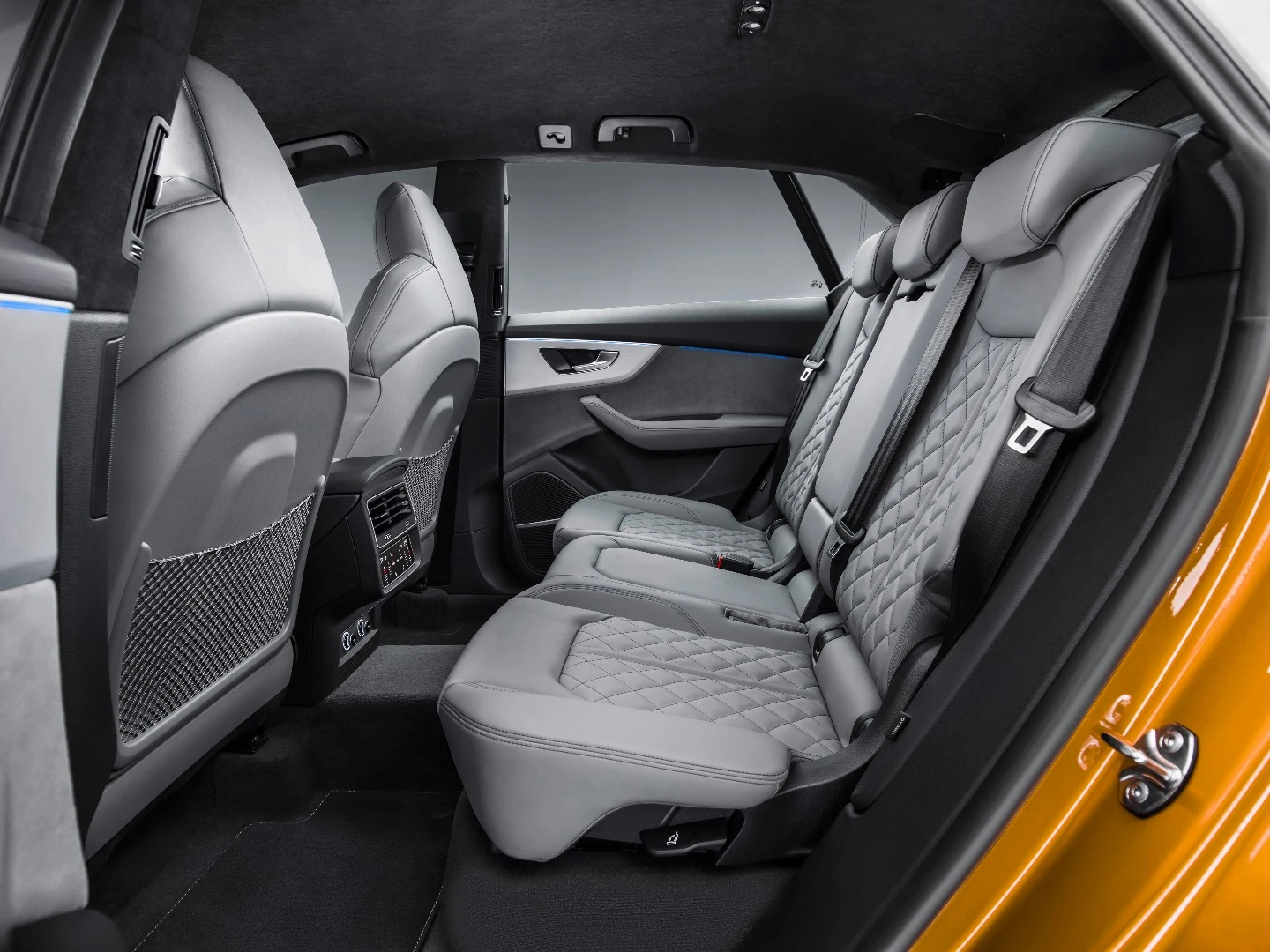 The four-seat (two in the rear) configuration of the concepts has given way to a more practical five-seat configuration in the Q8