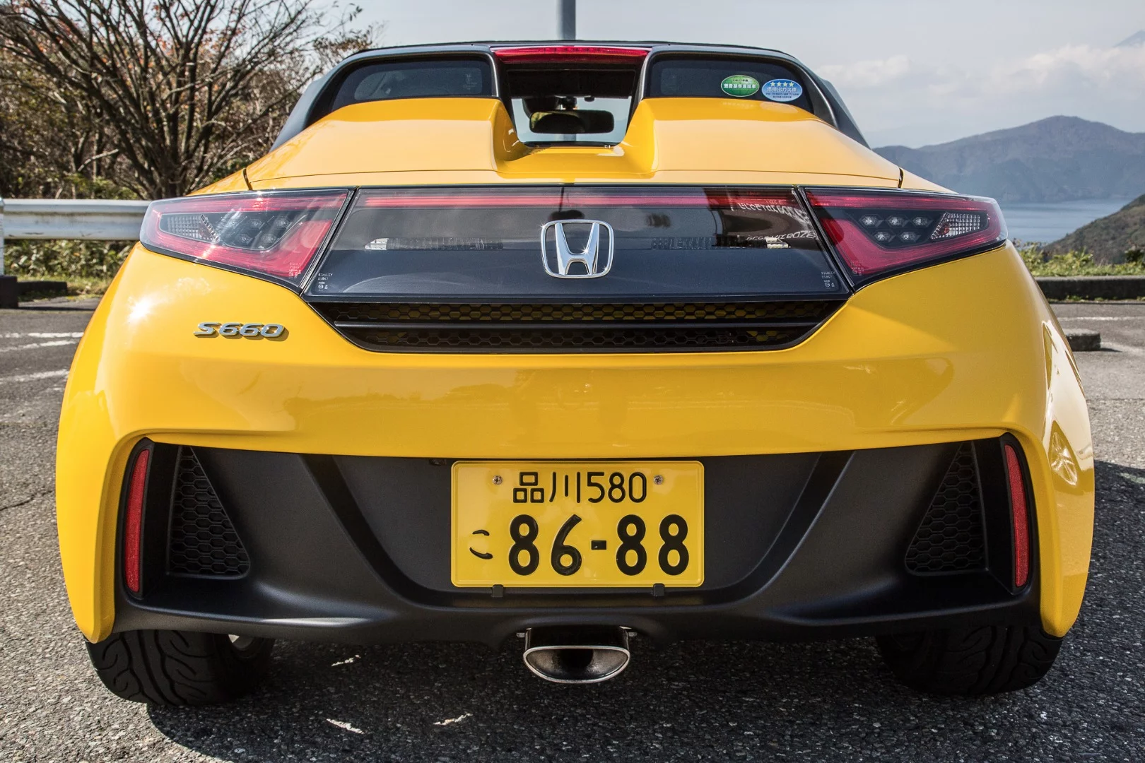 Those yellow plates are a sign the S660 fits Japan's Kei-car laws