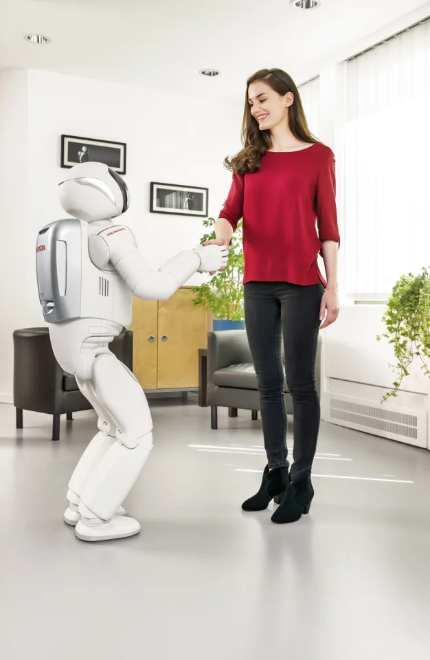 ASIMO can recognize the faces and voices of multiple simultaneous speakers, and change its behavior based on the perceived intention of the other party