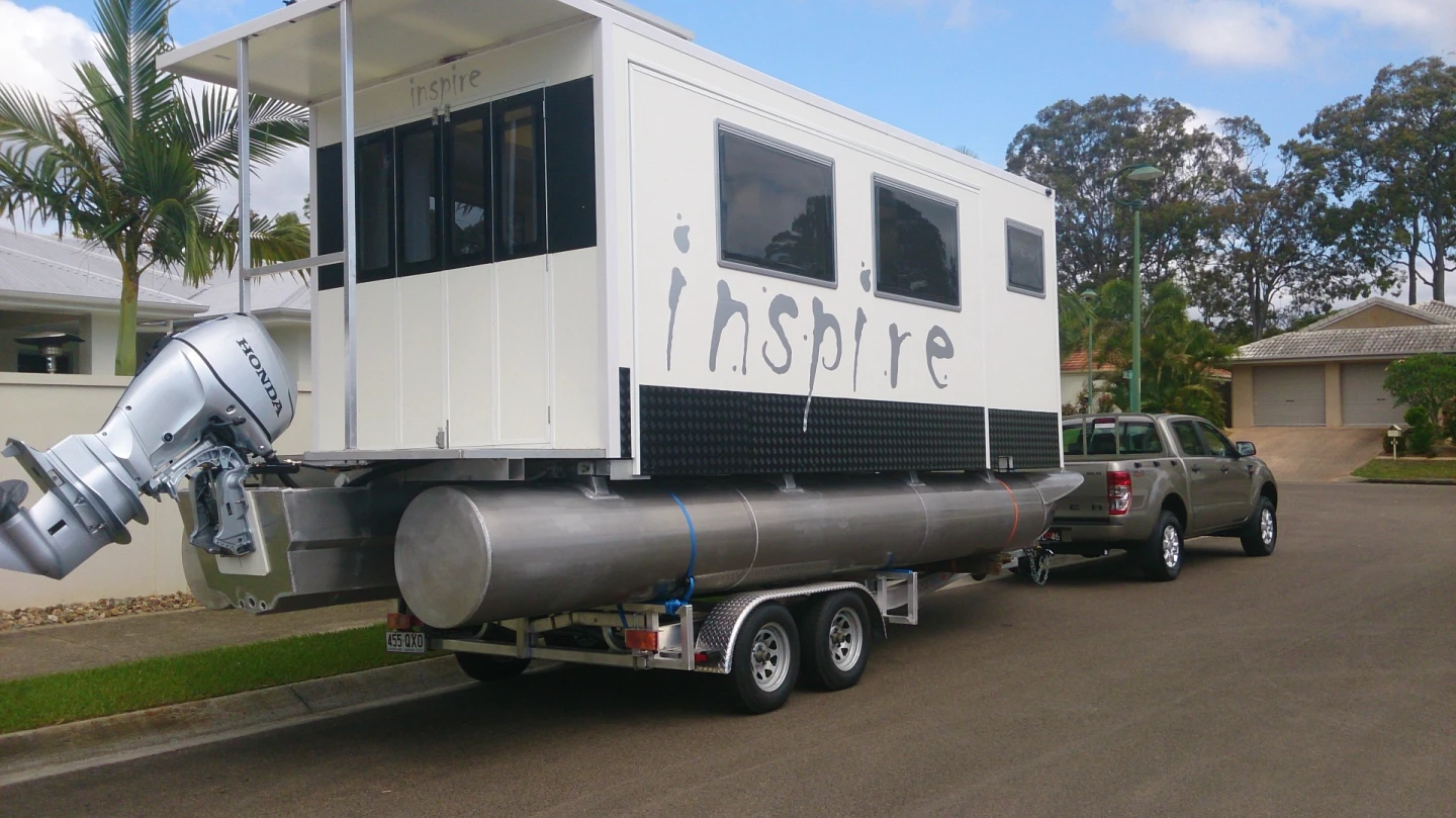 The Inspire isn't "compact" by any stretch of the imagination, but the side slide-outs allow it to fit comfortably on a trailer while offering more space at camp
