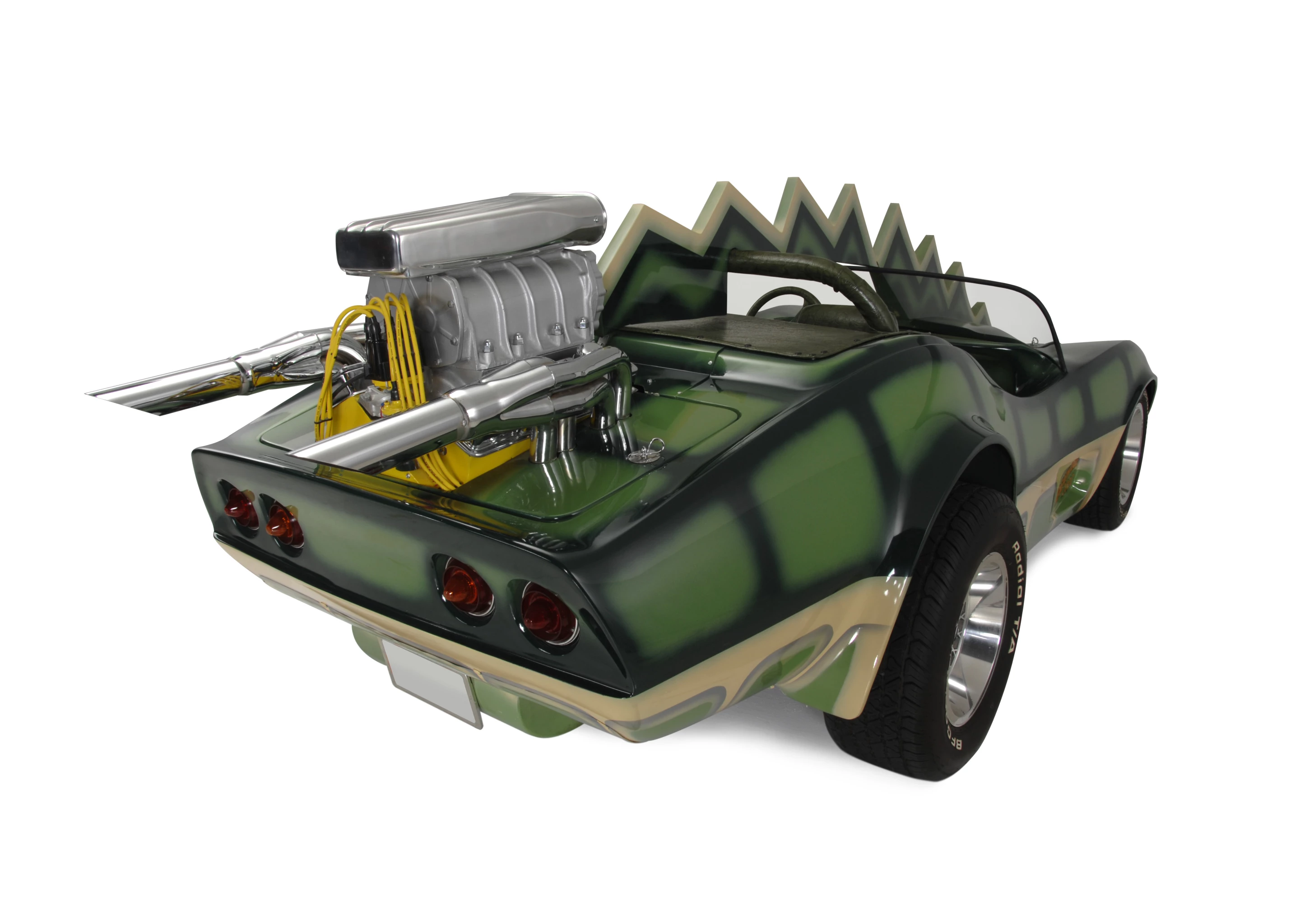 The car that is coming to auction is the Alligator Corvette driven by Carradine in Death Race 2000 (1975). The one-of-a-kind “alligator” Corvette (it's actually a Volkswagen chassis with an air-cooled Corvair motor), is expected to fetch between $20,000 and $25,000, despite the fact it got lots of screen time as Carradine (Frankenstein) fights against his deadly rival Stallone (Machine Gun Joe).