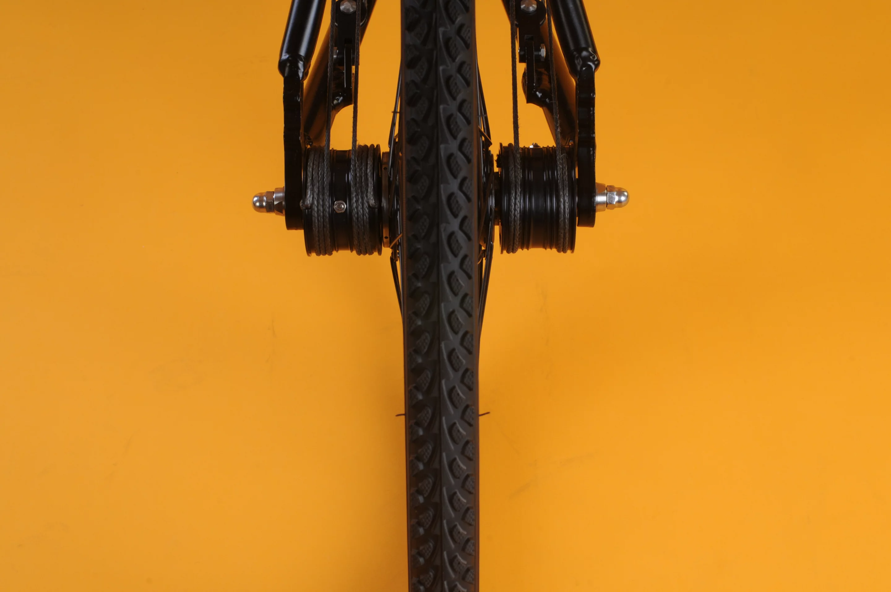 The dual drums of the rear wheel from the rear