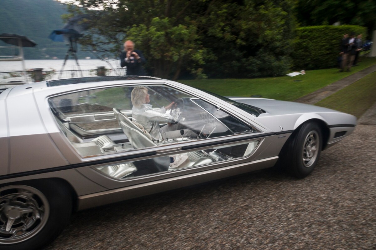 The Trofeo BMW Group Ragazzi went to the 1967 Lamborghini Marzal Four-Seater Coupé by Bertone. The spectacular Lamborghini Marzal was a prototype designed at Bertone by Marcello Gandini when Ferruccio Lamborghini decided he wanted a proper four-seater beyond the existing 400GT 2+2. Built on an extended Miura chassis, the Marzal's engine was half of a Lamborghini 4.0 liter V12, making for a compact 175 bhp (130 kW) 2.0 liter inline-six engine, mated to a 5-speed transmission.