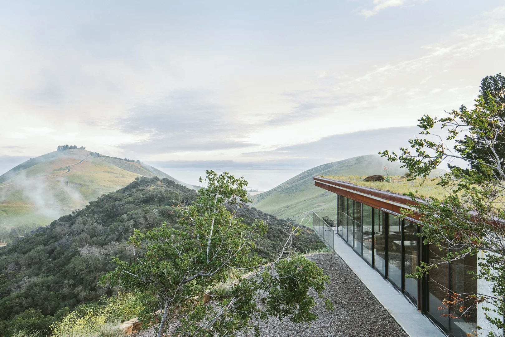 The Off-Grid Guest House's green roof is planted with local grasses and helps it blend into the unspoiled landscape