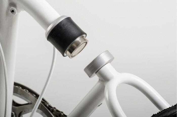 ... a combination coupler and rear shock absorber ...
