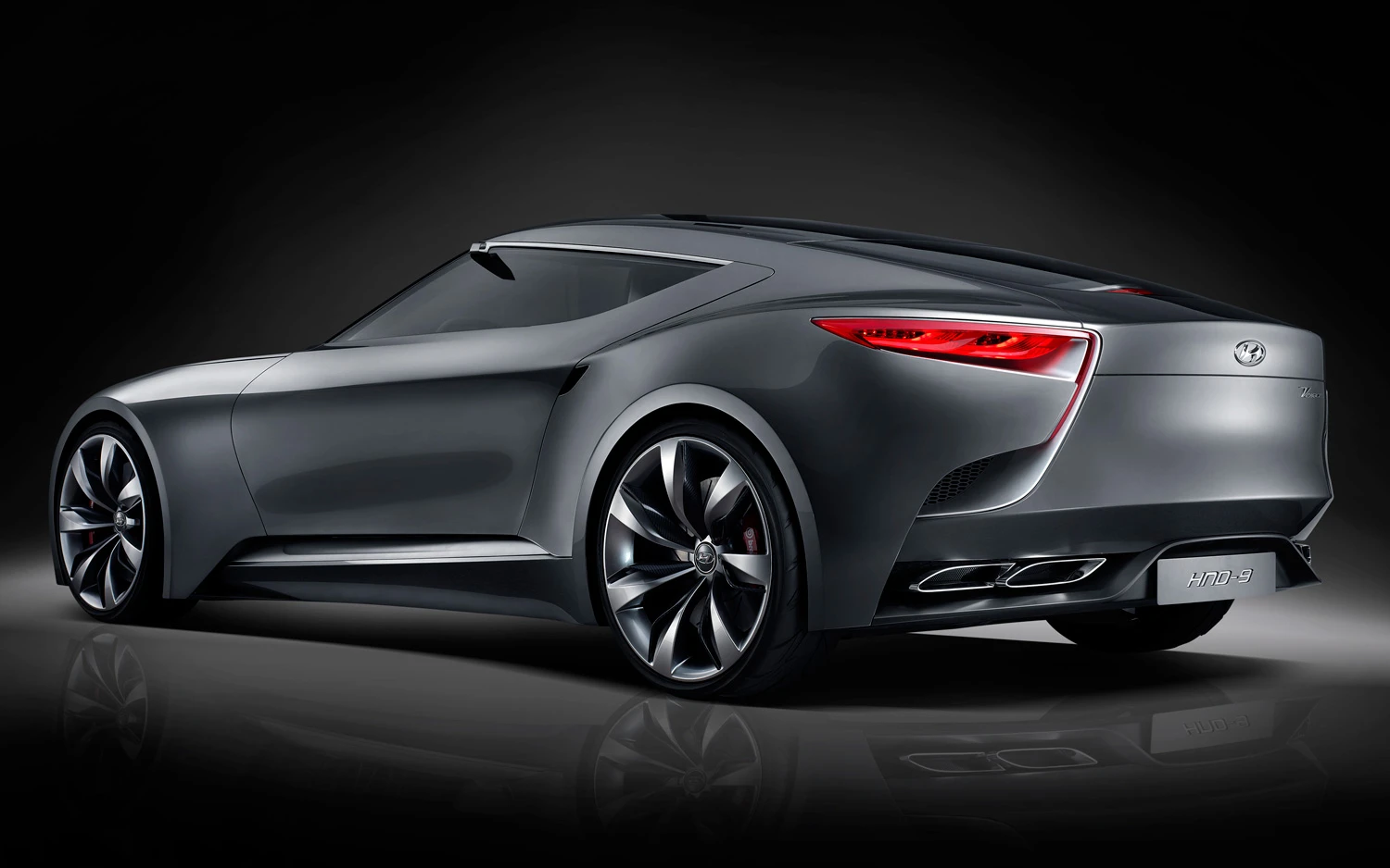 Sculpturally designed rear combination lamps strategically located between an assertive, long-raked hatch