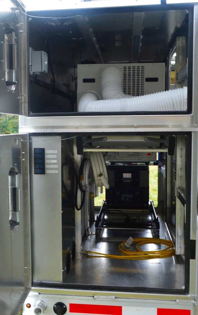 The upper and lower storage cabinets can house optional equipment or your own gear