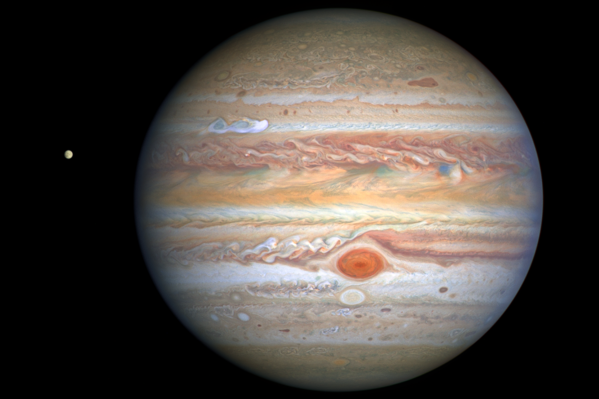 Snapped by Hubble on August 25, 2020, this image shows Jupiter's cloud bands and Great Red Spot in detail and reveals a new storm brewing, visible as a white smear in the upper left